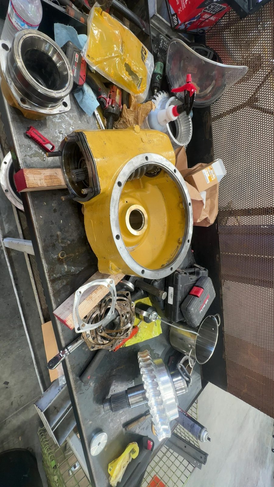 Heavy equipment powertrain and final drive component work